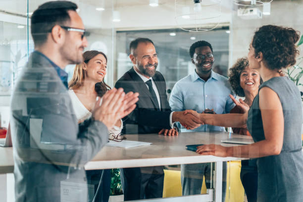 istock Shaking hands with new colleague 2168892121