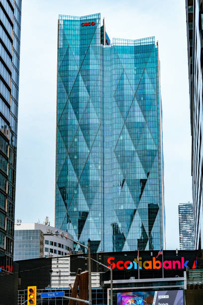 Stock photo looking directly up at a Houston skyrise downtown office building.