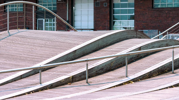 Toronto, Canada - August 25, 2024: Wavy architecture of the Simcoe Wavedeck - a local landmark in the waterfront district.