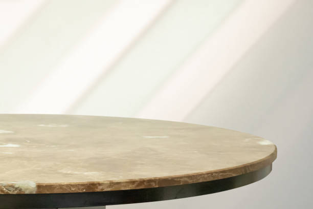 istock Round marble table top with abstract shadow drop on white wall background for mockup product display 2168900551