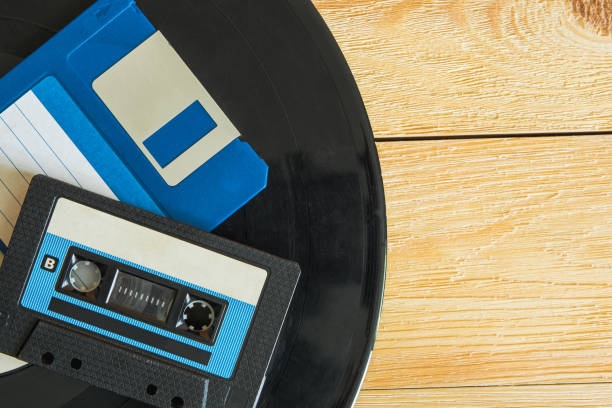 istock On the vinyl record are an audio cassette and a floppy disk 2168900809