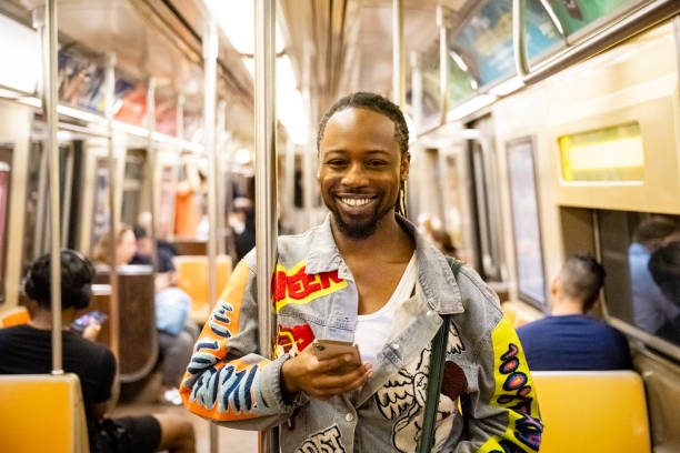 istock Young gay man riding on New York subway 2168900834