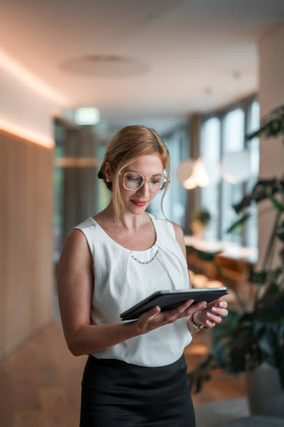 istock Modern Corporate Workspace with Businesswoman 2168902954