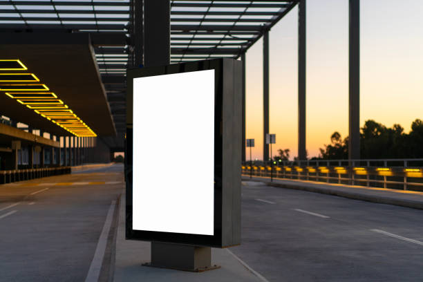 istock Blank billboard in city at dusk 2168906616