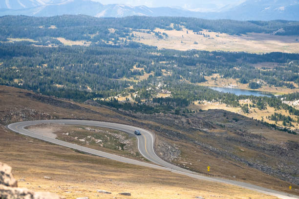 istock Car on a Mountain Highway from Above 2168916336