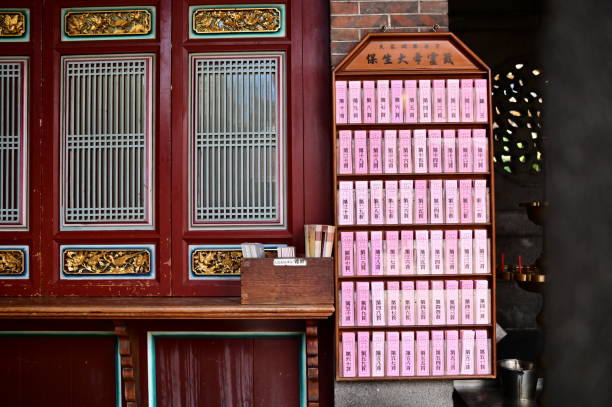 Taiwan - Jan 17, 2024: Close-up of the divination poem at Taipei Bao An Temple, a vital tool for seekers of guidance, reflecting life's various aspects and providing insight.