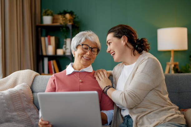 istock Young and senior women are using laptop 2168929212