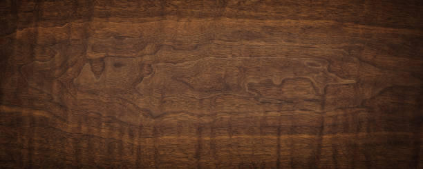 dark planks background, rustic wooden table surface. brown wood texture