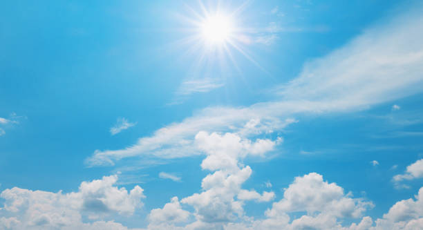istock The sky is blue with a few clouds and the sun is shining brightly 2168937111