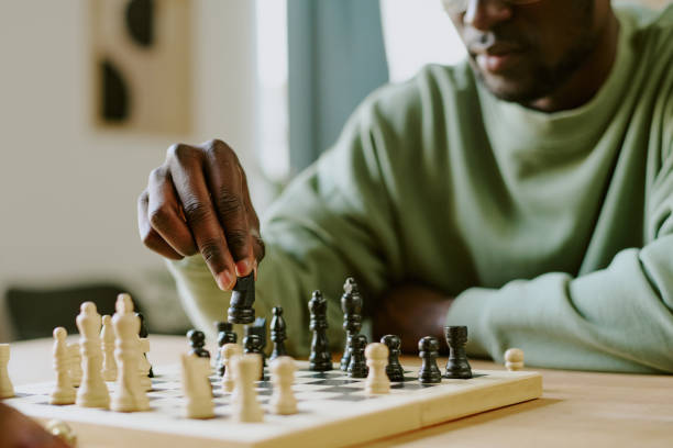 istock Black Chess Player Moving Knight Piece 2168942032