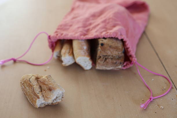 The bread is stored in a handmade bag