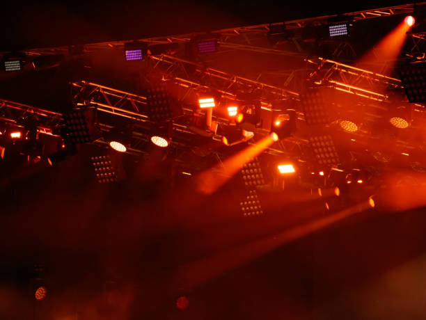 istock Red-orange color on stage at a concert 2168943722