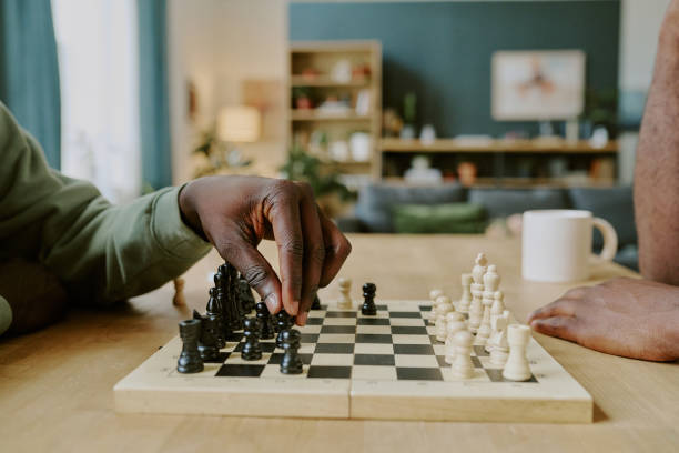 istock Hands Of Unrecognizable Men Playing Chess 2168944120