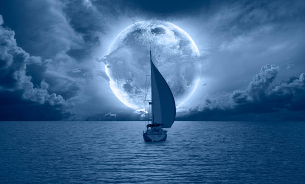 istock Lone yacht with Super Full Moon 2168945482