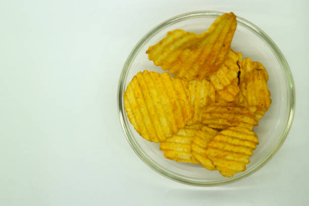 Top view of Potato chips on bowl. crispy and flavored