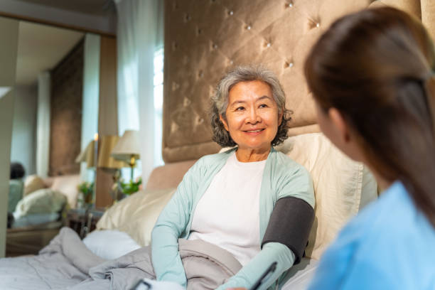 istock Doctor examine senior patient at home. 2168946392