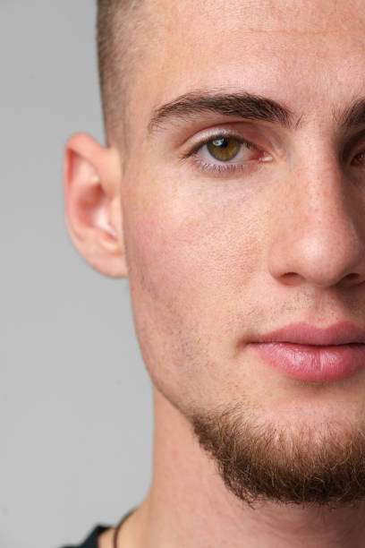 istock Close Up of Mans Face With Hazel Eyes 2168949332