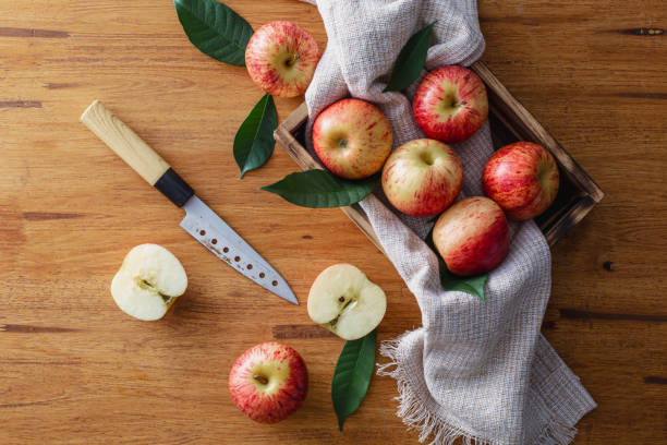 istock Fresh apples on a wooden background 2168952808