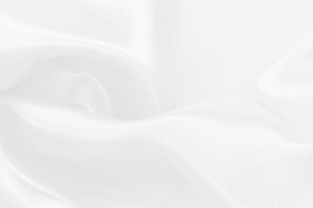 istock White fabric texture background, detail of silk or linen pattern. 2168957432