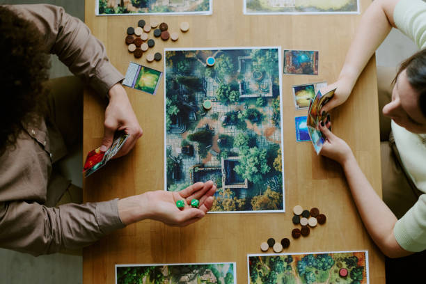 istock Couple Playing Board Game Top-down Shot 2168957973