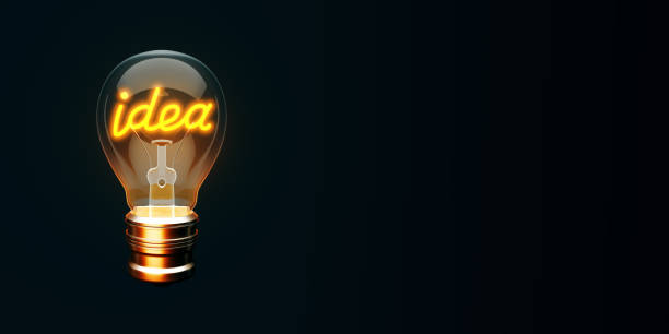 istock Glowing lightbulb with idea filament on dark background. 3D Rendering 2168958875
