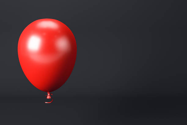 istock Red balloon with ribbon on dark background. 3D Rendering 2168959006
