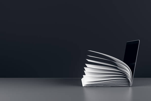 istock Open book transforming into a laptop on a dark background. 3D Rendering 2168959010