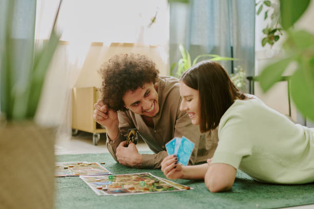 istock Cheerful Couple Playing Board Game On Their Day Off 2168961086