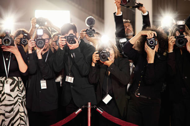 istock Professional photographers working at media event 2168961329