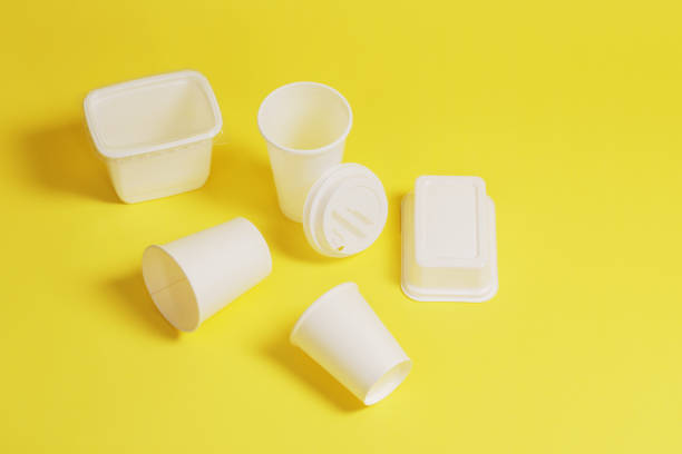 istock Set of disposable tableware on a yellow background. 2168963154