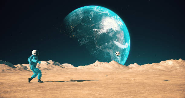 istock Astronaut On An Alien Empty Planet Playing Soccer. Shooting Slowly. 2168967578