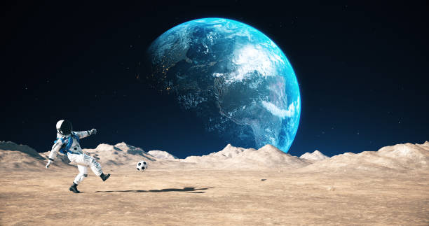istock Astronaut On An Empty Planet Playing Soccer. Shooting Slowly. 2168967688