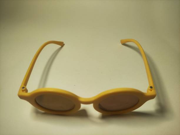 istock yellow glasses on a yellow background in photos from various sides 2168971013