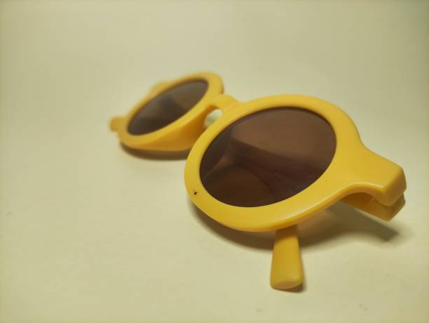 istock yellow glasses on a yellow background in photos from various sides 2168971042