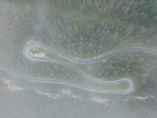 istock Top down drone view of mountain pass road 2168971256