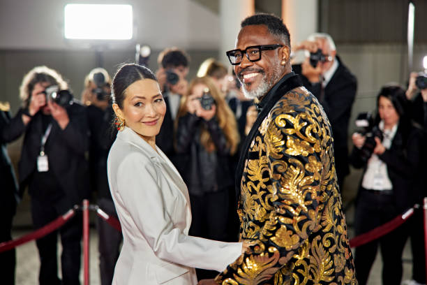 istock Mature celebrity couple on red carpet 2168976081