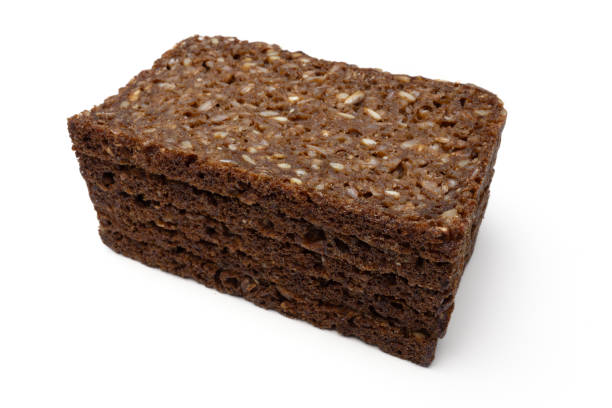 Close-up of freshly sliced rye bread with crunchy sunflower seeds, concept for healthy eating, rustic meals, or bakery advertisements