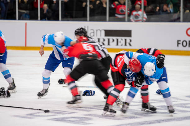 istock Intense Hockey Fight on Ice 2168982381