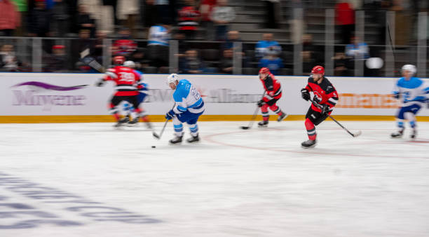 istock High-Speed Ice Hockey Action 2168982475