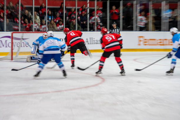 istock Fast-Paced Hockey Action Near the Goal 2168982490