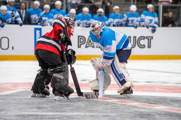 istock Goalie Showdown on the Ice 2168982528