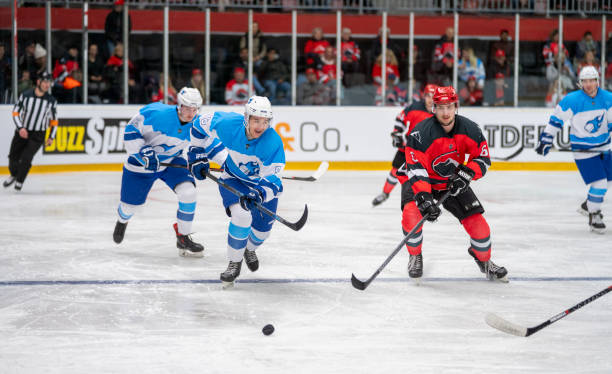 istock Intense Hockey Action on Ice 2168982572