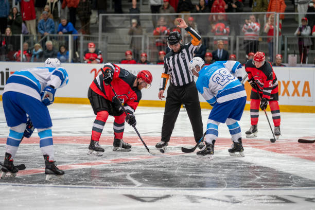 istock Faceoff Moment in Ice Hockey Game 2168982606
