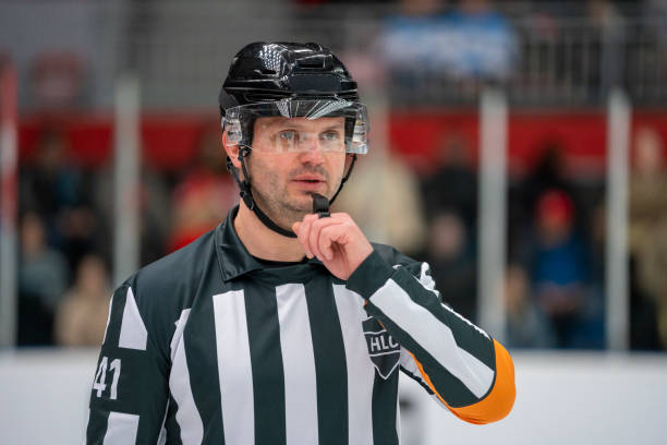 istock Focused Ice Hockey Referee with Whistle 2168982624
