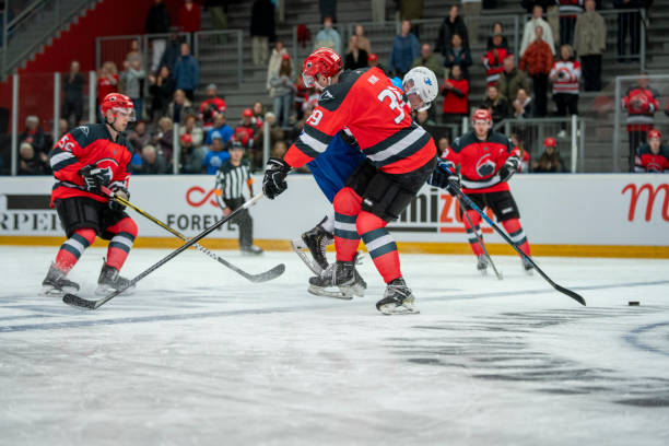 istock Intense Ice Hockey Tackle During Game 2168982804