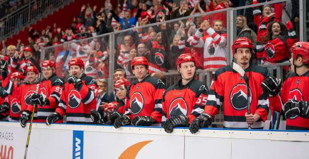 istock Ice Hockey Team and Fans Cheering 2168983020