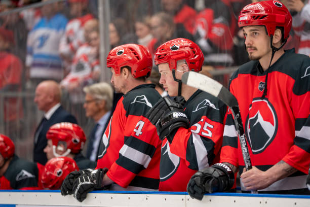 Focused Hockey Players on the Bench