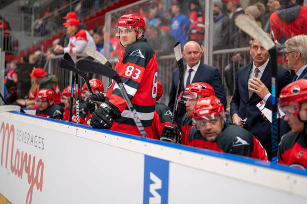istock Hockey Team and Coaches on the Bench During a Game 2168983202