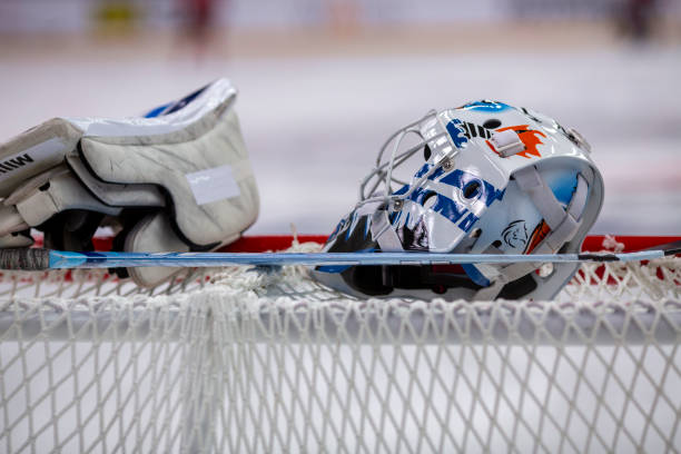istock Goalie's Gear Resting on the Net 2168983369