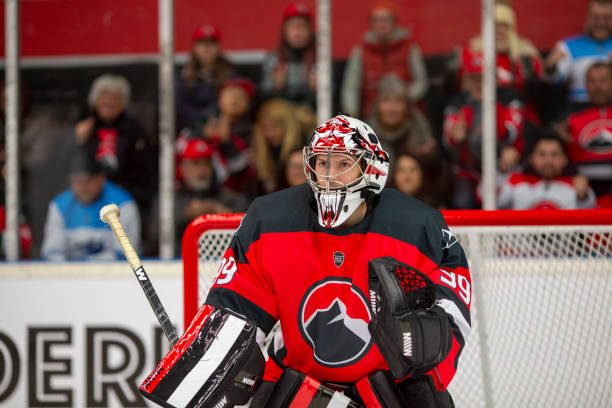 istock Intense Goalie Focus During Hockey Game 2168983593